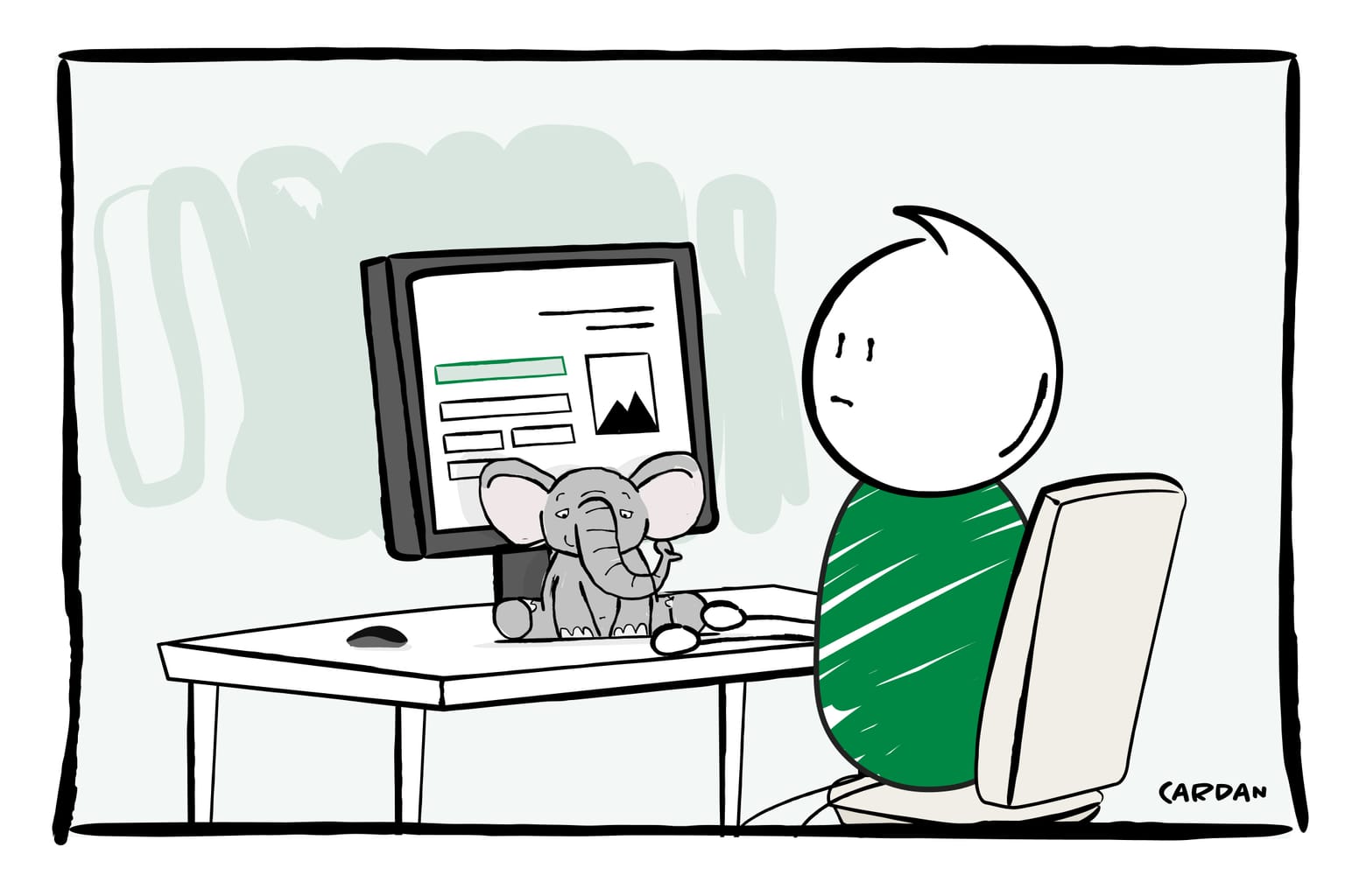 Cardan poppetje zit achter een computerscherm met een muis en in plaats van een toetsenbord een olifant