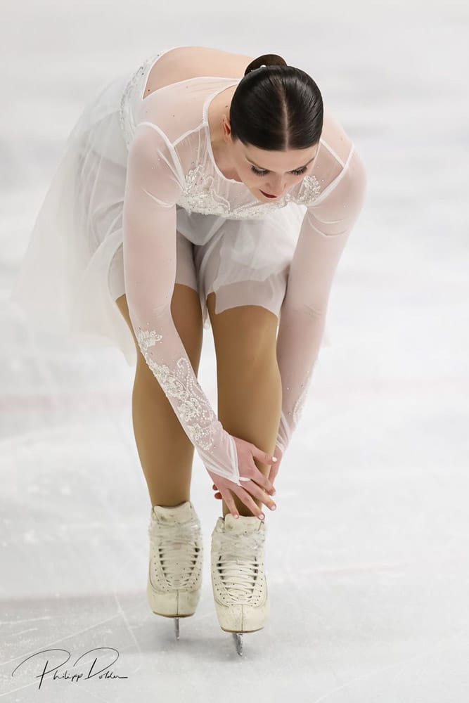 Een close-up van Jesse, onderzoeker bij Cardan het wereldkampioenschap synchroonschaatsen